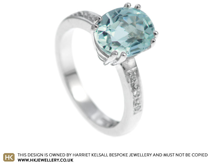 Dramatic Aquamarine and diamond engagement ring