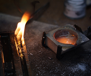 Molten Silver Poured into Cast