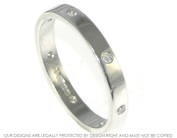 An 18ct white gold eternity ring with 7 HSI quality diamonds