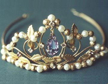 Full bridal tiara with set diamante, 
simulated pearls and gold plated flowers.