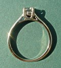 an 18ct white gold engagement ringwith a 0.5ct brilliant cut gsi diamond