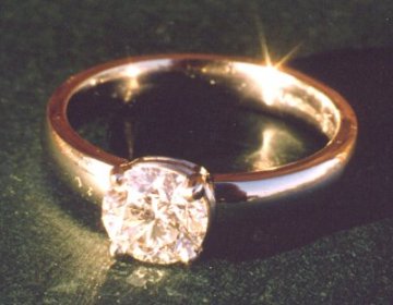 A Solitaire Engagement Ring in platinum.