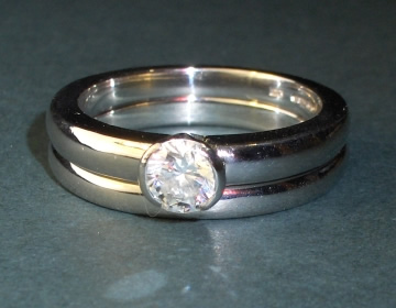 Bespoke platinum engagement ring and wedding band