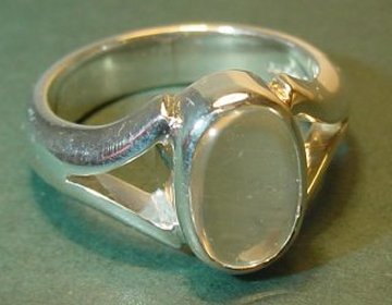 a sterling silver ring with a rare large blue moonstone