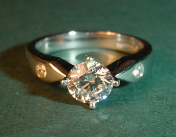 A platinum and diamond engagement ring