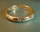 an 18ct yellow gold eternity ring