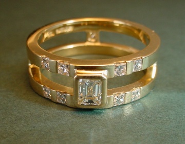 An 18ct yellow gold and diamond engagement ring