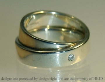 9ct white gold engagement/wedding ring with a 2mm HSI diamond.