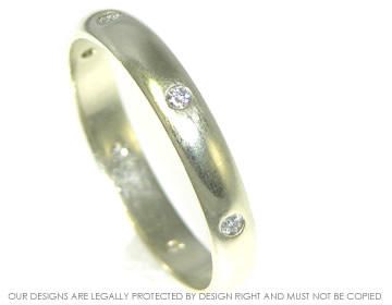 White gold satinised eternity ring with invisibly set diamonds 