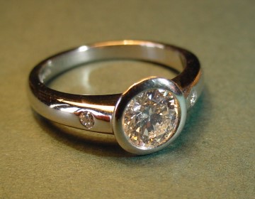 Open tipped platinum 0.63cts diamond engagement ring