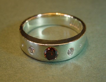 Simple 9ct white gold ring with chocolate cognac and white diamonds