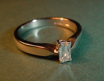 0.27cts emerald cut diamond platinum solitaire engagement ring