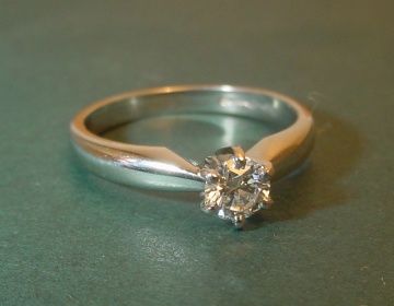 A platinum solitaire with a brilliant cut HSI diamond of 0.33cts.