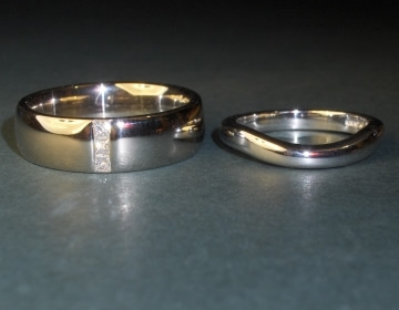 Pair of 18ct white gold engagement rings.