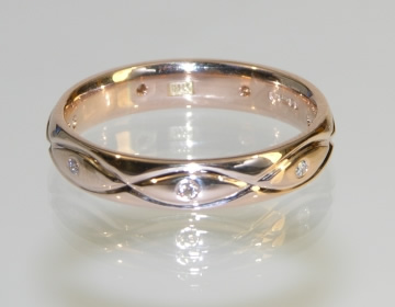 Bespoke rose gold and diamond engraved eternity ring