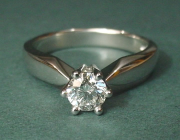 Classic platinum solitaire 0.51cts engagement ring.