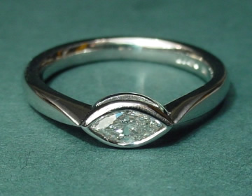 Platinum solitaire with 0.29cts marquise cut diamond.