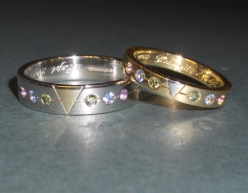 Bespoke pair of platinum and 18ct yellow gold rings.