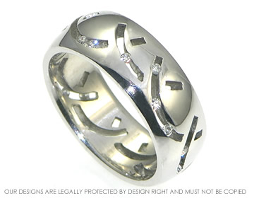 18ct white gold 'Chasing rainbows ' ring with channel set diamonds