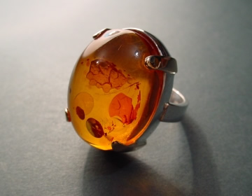 Amber silver and 9ct yellow gold ring using customer's own stone