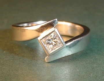 18ct white gold engagement ring with a princess cut diamond