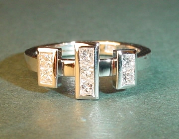 Art Deco inspired platinum ring with princess cut diamonds totalling 0.40cts