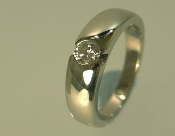 Flush set platinum solitaire with 0.35cts H SI diamond