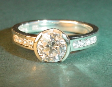 9ct white gold engagement ring with customer's own diamonds.