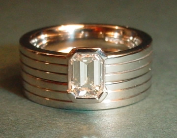 Bespoke engagement and wedding rings with engraved lines.