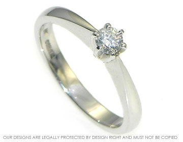 Platinum engagement ring with a 0.12ct  diamond