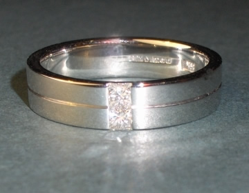 Platinum and diamond wedding ring.