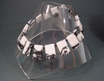 striking necklace with dalmation jasper slabs and onyx