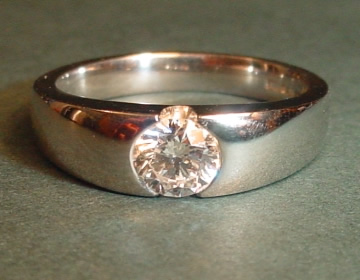 Platinum and diamond solitaire engagement ring