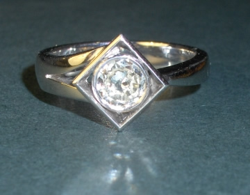 Bespoke asymmetrical diamond engagement ring