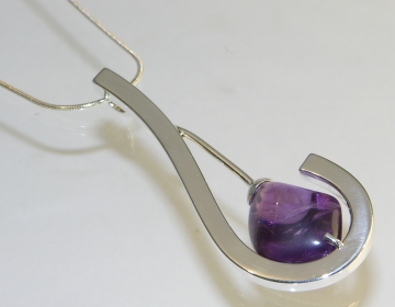 Bespoke silver pendant with amethyst pebble