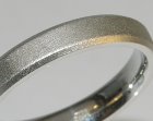 platinum wedding ring 4mm wide with a machined bevel edge
