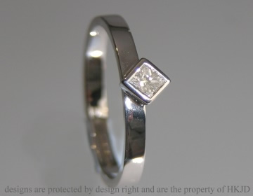 Platinum engagement ring with a princess cut diamond