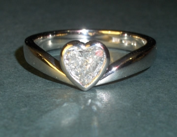 Bespoke heart shaped diamond engagement ring.