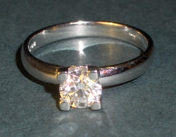 Bespoke simple solitaire modern engagement ring