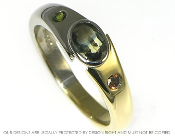 18ct yellow and white gold engagement ring with 0.57ct sapphire