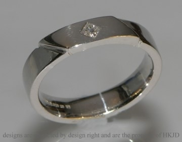 Geometric 9ct white gold diamond engagement ring.