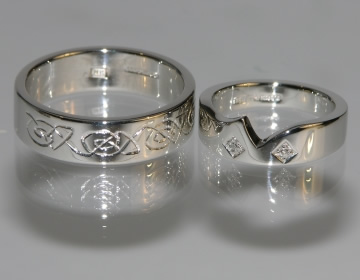 Celtic inspired mans wedding band and fitted ladies band with diamonds