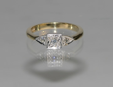 Bespoke engagement ring in a modern reworking of an antique style.