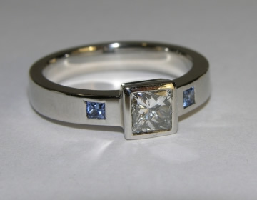 Bespoke sapphire and diamond platinum engagmenet ring