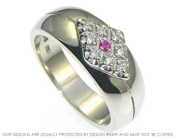 White gold ring with pave set diamonds and pink sapphire