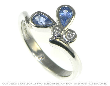 Blue butterfly platinum engagement ring.