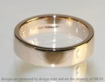 18ct rose gold 6mm flat profile band with a polished finish.