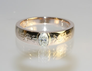 Bespoke rose gold and diamond engagement ring with runic engraving