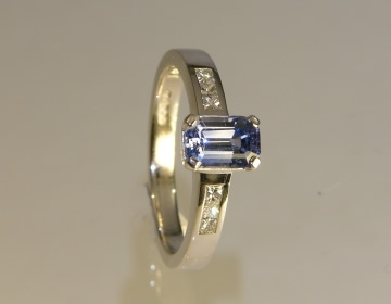 Bespoke sapphire and diamond white gold engagement ring