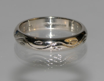 Bespoke engraved white gold wedding ring